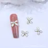 Nuevo Estilo Estilo Chanel Arte de Uñas Sencillo Joyería de Perlas y Moños Combinación Clásica Blanco y Negro Accesorios Metálicos para la Punta de los Dedos