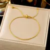 Pulsera de joyería de moda dorada ins para combinar con todo, pulsera de acero de titanio simple de lujo ligero, trébol de cuatro hojas para mujer, transfronteriza