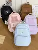 Nueva mochila de estilo universitario de alta apariencia transfronteriza para estudiantes de primaria y secundaria, mochila de gran capacidad para niñas