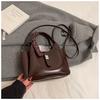 Bolso de moda de nicho para mujer, nuevo bolso de hombro con textura cruzada de invierno 2024, bolso de mensajero popular, bolso de cubo portátil