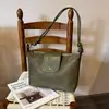 Nova coleção outono/inverno 2026: bolsa de ombro moderna, casual e estilosa com uma vibe descontraída, grande capacidade, versátil e perfeita para o uso diário