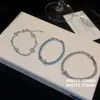 ¡Cuerda colorida con diamantes brillantes! Pulsera de vid de uva tejida, diseño de nicho de lujo ligero, sensación exquisita y de alta gama, accesorio de mano versátil