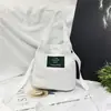 Atacado Primavera e Verão Nova Mochila de Lona Feminina Bolsa de Mão Bolsa Transversal de Ombro Cor Doce Porta-moedas para Celular