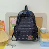 Mochila al por mayor estilo coreano estilo universitario versátil para ir al trabajo y a la escuela para mujer alta apariencia gran capacidad mochila casual escolar