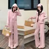 Conjunto con capucha elegante y casual para mujer, nueva colección primavera 2026, sudadera con capucha de moda y que estiliza, y pantalones de pierna ancha, conjunto de dos piezas