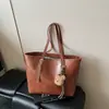 Bolso retro color Maillard 2026 Otoño/Invierno nuevo bolso tote de gran capacidad versátil bolso de mano con textura de alta calidad bolso para el día a día