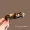 Presilha de Cabelo de Pelúcia com Laço Estilo Coreano para Mulheres 2026 Nova Presilha Lateral de Alto Padrão para Franja, Presilha Oval para Testa, Grampo para Cabelos Soltos