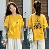 Camiseta de algodón a rayas de manga larga, estilo coreano y moderna, para niñas, un nuevo diseño de primavera/otoño, corte holgado, versátil y con cuello redondo, adecuada para niños de talla mediana a grande