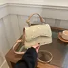 Moda nova transfronteiriça temperamento elegante renda tecida palha tecida personalidade ombro único transversal pequena quadrada bolsa feminina fábrica customizada