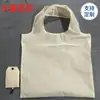 Fábrica en stock al por mayor color sólido plegable respetuoso con el medio ambiente bolsa de compras logotipo imprimible 190T poliéster almacenamiento bolso de mano bolsa