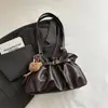 Bolso de hombro retro de color sólido 2026, alta estética, nuevo diseño de moda, elegante y moderno, adecuado para ir al trabajo, con correa de hombro plisada