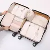 Bolsa de almacenamiento directo de fábrica nuevo traje al por mayor caliente multi-funcional viaje siete piezas bolsa de almacenamiento para clasificación de ropa