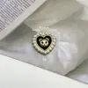 Nuevas gotas de aceite aleación panda blanco y negro accesorios lindo caricatura diamante perla joyería colgante tocado zapatos material de flor