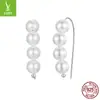 Fábrica de dijes de plata aretes de perla con temperamento de plata de ley S925 aretes de concha simples Joker ventas directas de fábrica