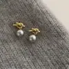 Pendientes de perlas grises anudados estilo coreano para mujer, estilo nicho, lujo ligero, a la moda, versátiles, pendientes de alta gama