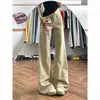 Jeans acampanados retro color caqui estilo americano, nuevo modelo primavera 2026, pantalones de campana holgados adelgazantes de tiro bajo estilo americano