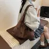 Bolsa de Ombro Feminina Recorte Retro Coreana Outono e Inverno 2025 Nova Bolsa Tote para o Trabalho Bolsa de Mão Casual em Camurça
