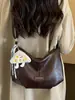Bolso bandolera de diseño de nicho de alta gama con correa ancha para mujer, nuevo bolso de hombro de moda 2026 para commuting