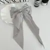 Clip de resorte con lazo de perla, accesorio para el cabello de alta gama, elegante y francés para celebridades de Internet.