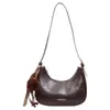 Bolso de diseño de nicho retro de alta gama para mujer 2026 nuevo popular versátil de un solo hombro para debajo del brazo bolso de albóndiga de otoño