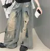 Conjunto de Dos Piezas para Niñas 2026 Verano Nuevo Camiseta de Manga Corta y Jeans Anchos Estilo Americano Desgastados Moderno