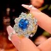 Joia Zhuangshengsheng 2025 Nova Base de Cobre Banhada a Ouro Topázio Azul Sintético Cor Azul Centáurea Conjunto de Luxo Leve para Mulheres 12-10m