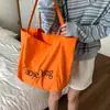Bolso de Lona con Letra Estilo Universitario para Mujer 2025 Nuevo de Moda Tendencia Estilo Coreano Bolso Tote Casual de Gran Capacidad Bolsa de Compras