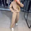 2024 Europa e Estados Unidos transfronteiriços outono e inverno explosões feminino casual gola redonda manga longa corpo inteiro perfuração quente corda toe terno de duas peças