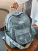 Mochila transfronteiriça de grande capacidade, estilosa, novo modelo 2026 para alunos do ensino fundamental, mochila escolar, mochila versátil casual para viagem