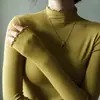 Top base de manga larga para mujer con dobladillo de volantes, nueva colección primavera 2026, ropa interior otoño/invierno, camiseta de manga larga, top de cuello medio-alto