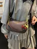 Moda estilo coreano simple y elegante color liso gran capacidad otoño 2026 nuevo popular bolso cruzado de hombro para mujer