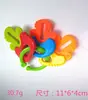 Sonajero para Bebé Educativo de Plástico Portátil Juguete para Niños Educación Temprana Mordedor Diente Morder Alivio Sonajero Donut Palillo Molar