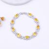 Europa e Estados Unidos novo pulseira de zircônia AAA de quatro folhas para meninas AliExpress pulseira de cobre com incrustação de pedra colorida atacado