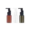 Botella dispensadora portátil de 50 ml de PET para loción de aceite desmaquillante con cabezal de bomba, botella para tónico, material de empaque de belleza, en stock, venta directa de fábrica