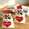 10.1 Decorações de bolo para o Feliz Dia Nacional, eu amo meu país, cartões em formato de coração, figuras de panda acenando bandeiras e toppers de bolo