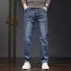 Jeans casuales versátiles de pierna recta holgados 2025 nuevos pantalones elásticos de negocios ajustados pantalones casuales