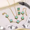 Acero de Titanio Chapado en Oro Transfronterizo Más Vendido Acero Inoxidable Pulsera, Collar, Anillo y Pendientes de Trébol de Cuatro Hojas Conjunto Fábrica al por Mayor