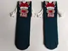 Calcetines de mano transfronterizos personalizados calcetines lindos de color monocromático a juego calcetines de media pantorrilla calcetines para las Cuatro Estaciones algodón Navidad novias calcetines de moda