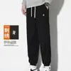 Pantalones casuales con puño, más terciopelo, más gruesos, venta al por mayor de comercio exterior transfronterizo, nuevos pantalones largos holgados de Otoño Invierno 2026 para hombre, pana