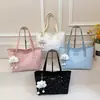 Bolsa Tote de Gran Capacidad 2026 Transfronteriza Verano Nuevo Estilo Versátil para Viajar de un Solo Hombro Debajo del Brazo Bolsa Tote Texturizada de Mano