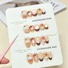 Uñas postizas temáticas de otoño, hechas a mano, con diseños lindos pintados a mano, estilo cat-eye juvenil e inspirado en Francia, disponibles para venta al por mayor