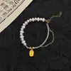 Pulsera tejida de estilo nacional ~ pulsera de mariposa y loto tejida a mano de moda nueva marea nacional china cuerda de mano al por mayor