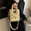 Bolsa color caramelo para mujer, nueva moda, linda, de red, popular, portátil, bolsa de playa de EVA, bandolera, bolsa cuadrada pequeña de gelatina, venta al por mayor