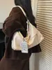 Bolso de axila de diseño de nicho versátil de moda transfronterizo, bolso cruzado de gran capacidad de alta gama, bolso tipo dumpling con bloques de color para commuters