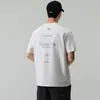 Camiseta de Verano 2026 de Manga Corta y Cuello Redondo Negra Blanca Beige Corte Holgado Con Etiqueta Sin Cuello