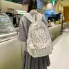 Mochila Floral Literaria Estilo INS Japonés Nueva para Mujer Bolso de Doble Hombro Fresco Versátil Mochila de Viaje Casual Venta al por Mayor