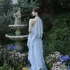 Atuendo de principios de verano 2026: Vestido Largo Estilo Resort Francés con Volantes, Dobladillo Irregular, Elegante Vestido de Cuello Halter
