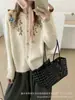 Cárdigan de punto con bordado floral estilo coreano para mujer, nuevo suéter abrigo suave de cuello redondo holgado para otoño e invierno, top versátil