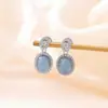 Pendientes de botón Yilu de Plata de Ley S925 con Aguamarina, Forma Ovalada Geométrica, Versátiles, Lujo Ligero, Frescos y Elegantes para el Trabajo