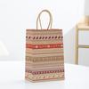 Bolsa de papel para regalo, embalaje de comercio exterior, embalaje navideño, bolsa de papel kraft manual, regalo para niños, bolso de papel decorativo.